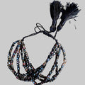 Sannes Armband schwarz rosa