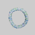 Strasshaarband - Strassarmband in Pastell Mix