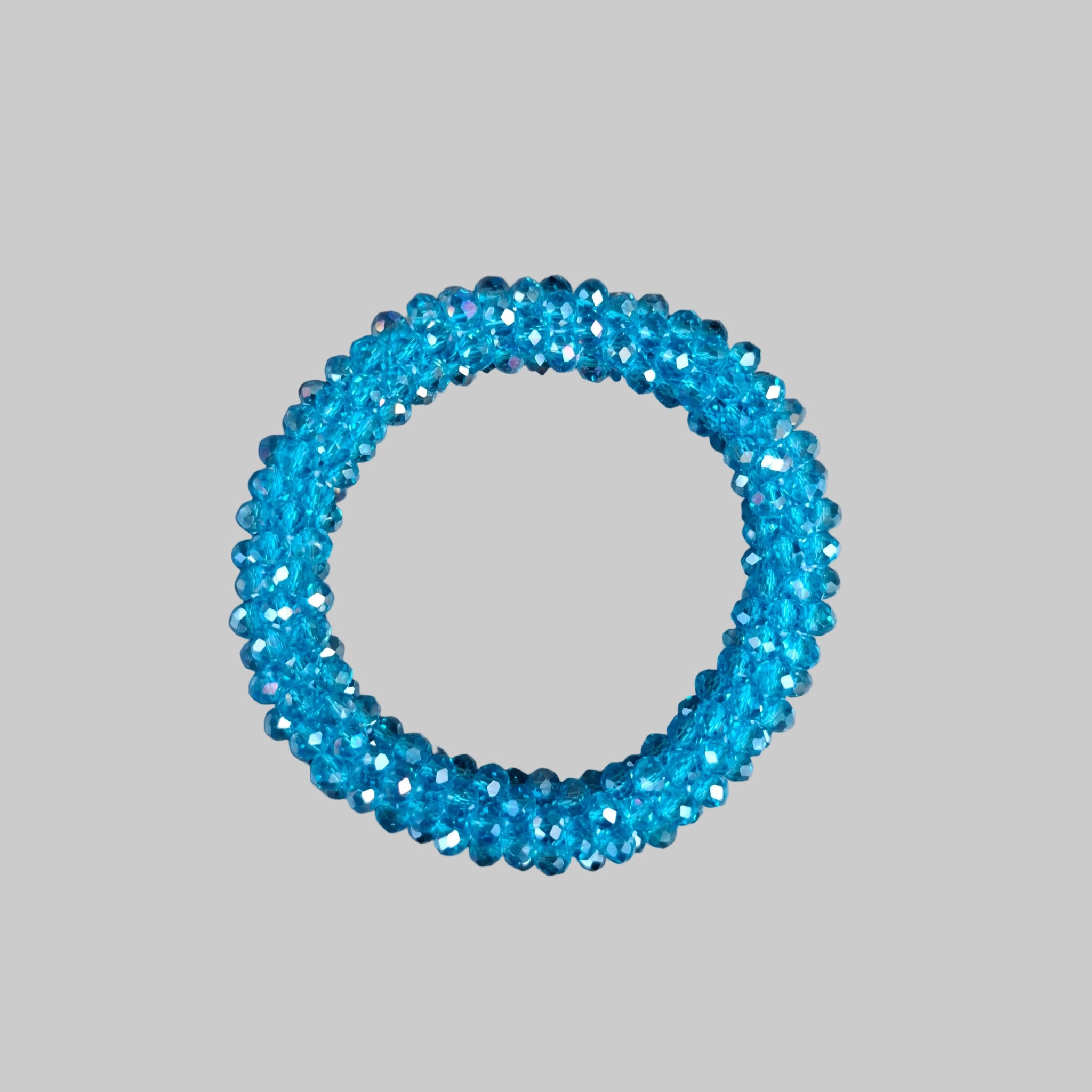 Strasshaarband - Strassarmband in Türkis transparent